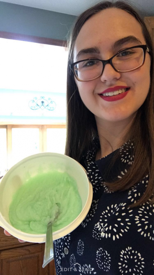 Signy Mastel holding a fresh bowl of her peppermint sugar scrub.