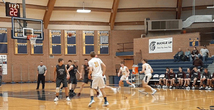 Carson Critchley (21) ready for a pass at the three point line
