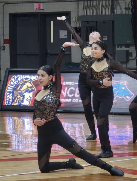 Freshman Melissa Osorno, and Seventh graders Autumn Roberts and Cameron Bratton in the final pose of the kick routine. 