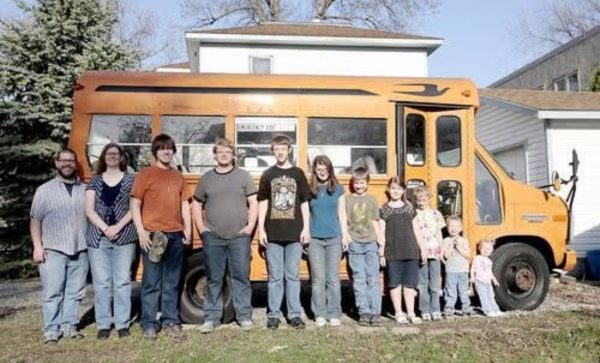 A family of 11 doesn't fit in a standard vehicle. My family got a bus to travel together when I was about 7 years old. We called it the 'Wie-Bus'. 